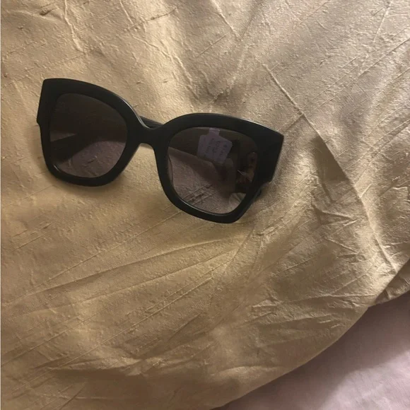 Kurt Geiger Black Sunglasses with Eye Details - Picture 6 of 6